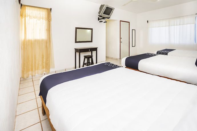 Imagen de la habitación del Hotel Capital O Oxtankah,chetumal bay. Foto 4