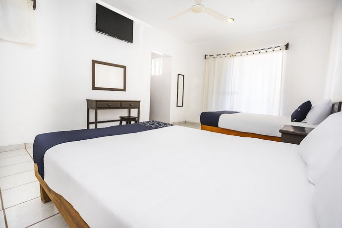 Imagen de la habitación del Hotel Capital O Oxtankah,chetumal bay. Foto 6