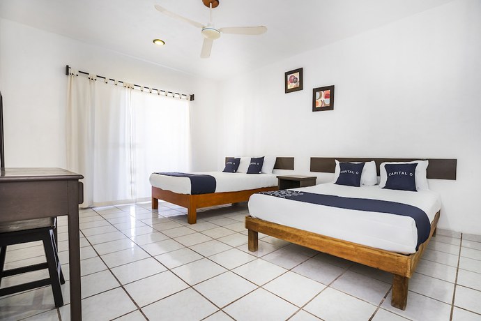 Imagen de la habitación del Hotel Capital O Oxtankah,chetumal bay. Foto 9
