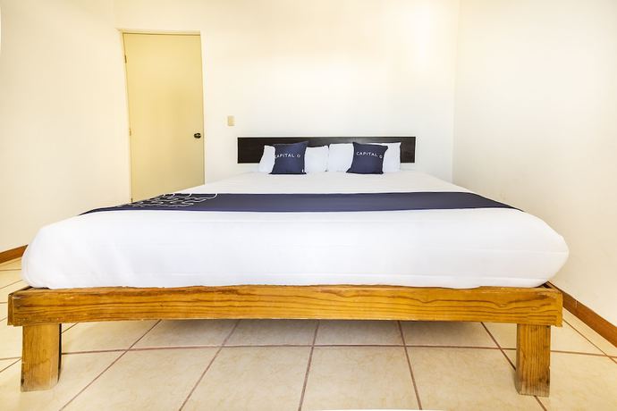Imagen de la habitación del Hotel Capital O Oxtankah,chetumal bay. Foto 10