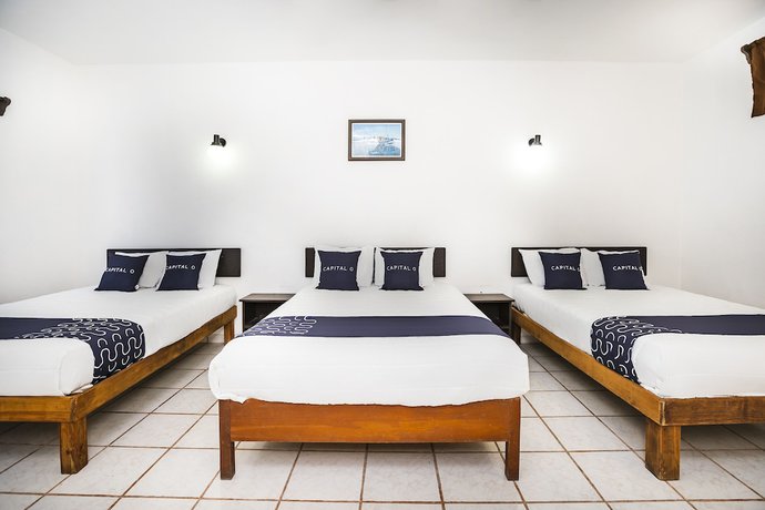 Imagen de la habitación del Hotel Capital O Oxtankah,chetumal bay. Foto 14
