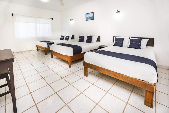 Imagen de la habitación del Hotel Capital O Oxtankah,chetumal bay. Foto 15