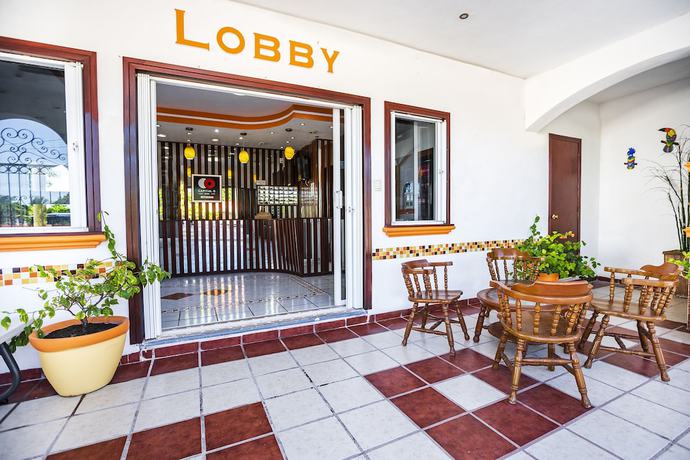 Imagen de los interiores del Hotel Capital O Oxtankah,chetumal bay. Foto 20