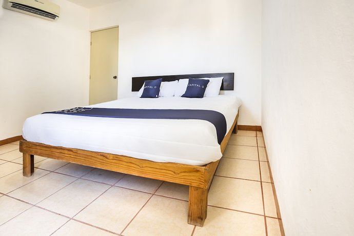 Imagen de la habitación del Hotel Capital O Oxtankah,chetumal bay. Foto 17