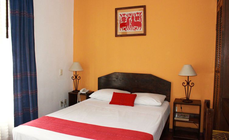 Imagen de la habitación del Hotel Capital O Parador Crespo , Oaxaca. Foto 3