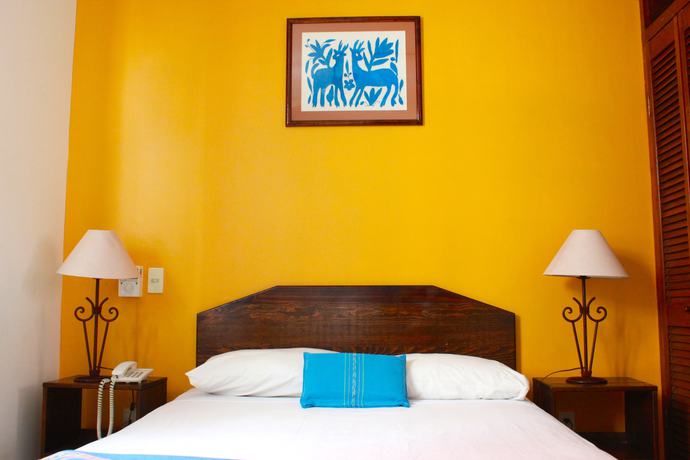 Imagen de la habitación del Hotel Capital O Parador Crespo , Oaxaca. Foto 4