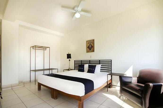 Imagen de la habitación del Hotel Capital O Plaza Galindo. Foto 12