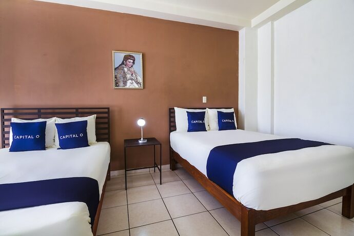 Imagen de la habitación del Hotel Capital O Plaza Galindo. Foto 15