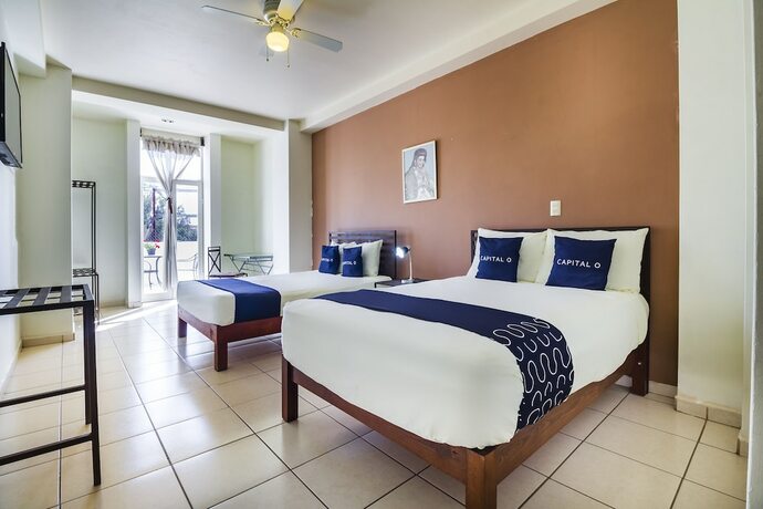 Imagen de la habitación del Hotel Capital O Plaza Galindo. Foto 17