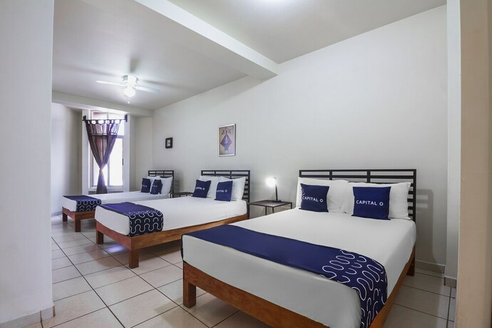 Imagen de la habitación del Hotel Capital O Plaza Galindo. Foto 20