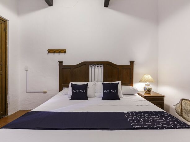 Imagen de la habitación del Hotel Capital O Posada La Casa De La Tia, Oaxaca. Foto 12