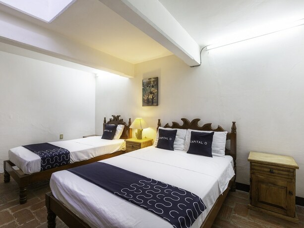 Imagen de la habitación del Hotel Capital O Posada La Casa De La Tia, Oaxaca. Foto 13