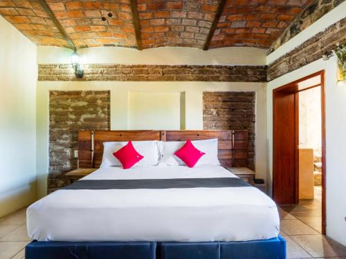 Imagen de la habitación del Hotel Capital O Posada Terraza. Foto 6