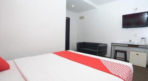 Imagen general del Hotel Capital O Ridel Kota Bharu. Foto 14