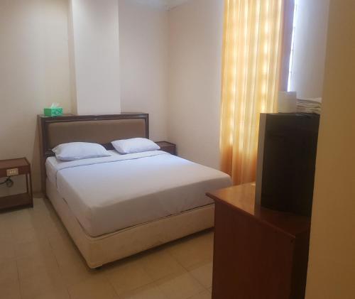 Imagen de la habitación del Hotel Capital O Siwah. Foto 17