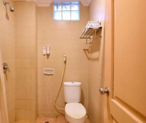 Imagen de la habitación del Hotel Capital O Siwah. Foto 20
