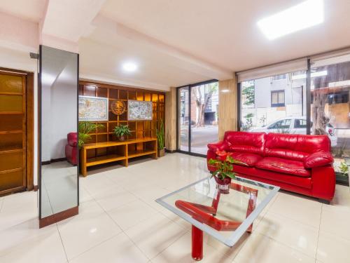 Imagen de la habitación del Hotel Capital O Suites Marne Cdmx. Foto 7