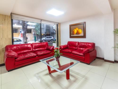 Imagen de la habitación del Hotel Capital O Suites Marne Cdmx. Foto 9