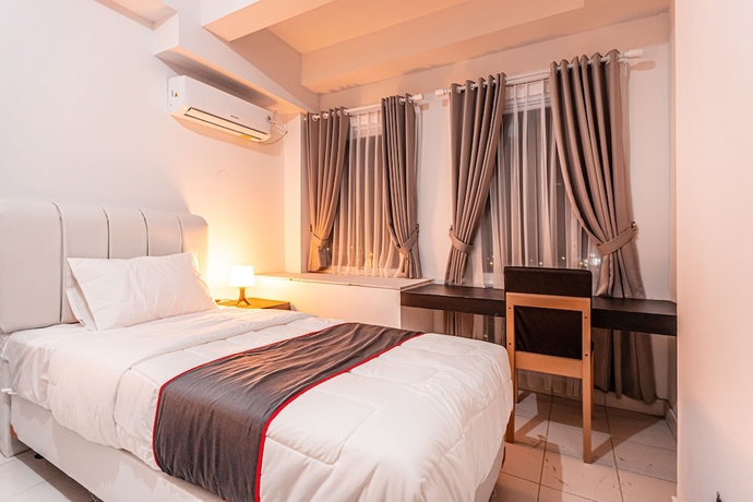 Imagen de la habitación del Hotel Capital O Urbano. Foto 5