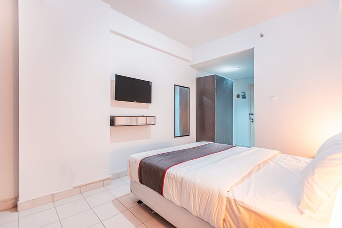 Imagen de la habitación del Hotel Capital O Urbano. Foto 6
