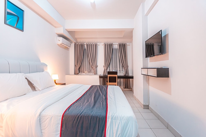 Imagen de la habitación del Hotel Capital O Urbano. Foto 9