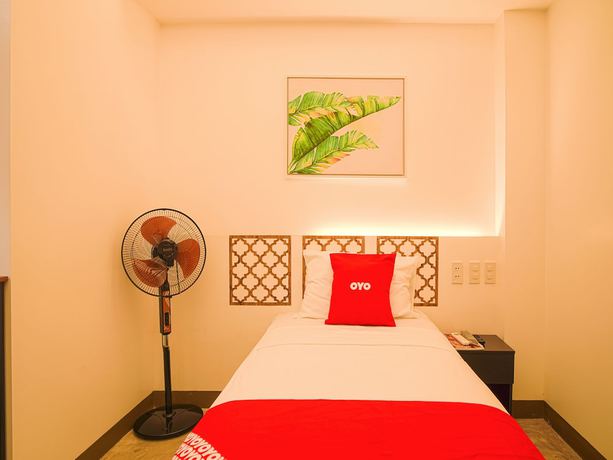 Imagen de la habitación del Hotel Capital O Vaccinated Staff - OYO 785 The Greenhive. Foto 4