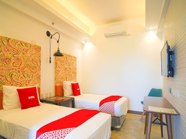Imagen de la habitación del Hotel Capital O Vaccinated Staff - OYO 785 The Greenhive. Foto 17