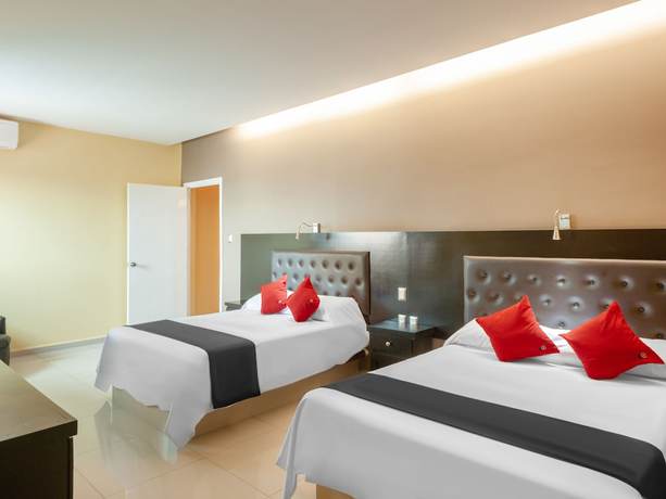 Imagen de la habitación del Hotel Capital O Veracruz Suites. Foto 6