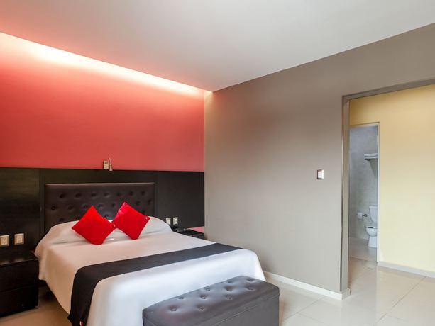 Imagen de la habitación del Hotel Capital O Veracruz Suites. Foto 7