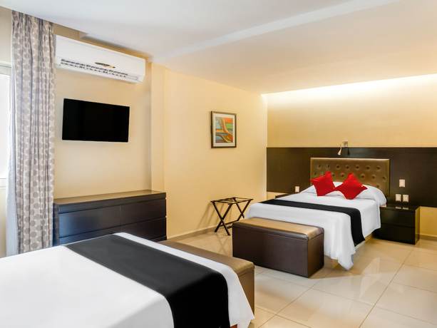 Imagen de la habitación del Hotel Capital O Veracruz Suites. Foto 14