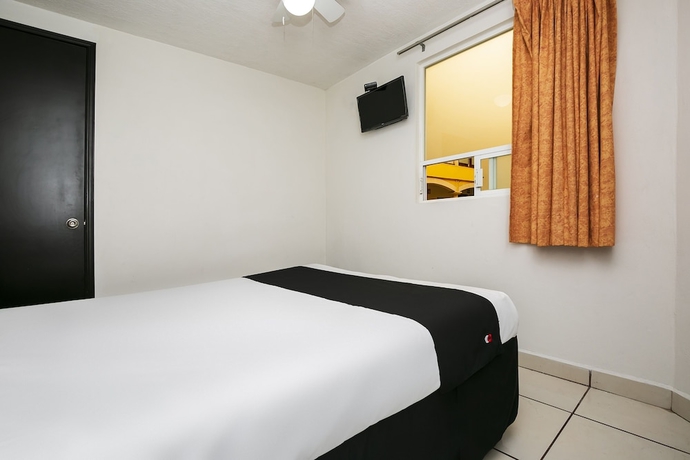 Imagen de la habitación del Hotel Capital O Victoria Morelia. Foto 3