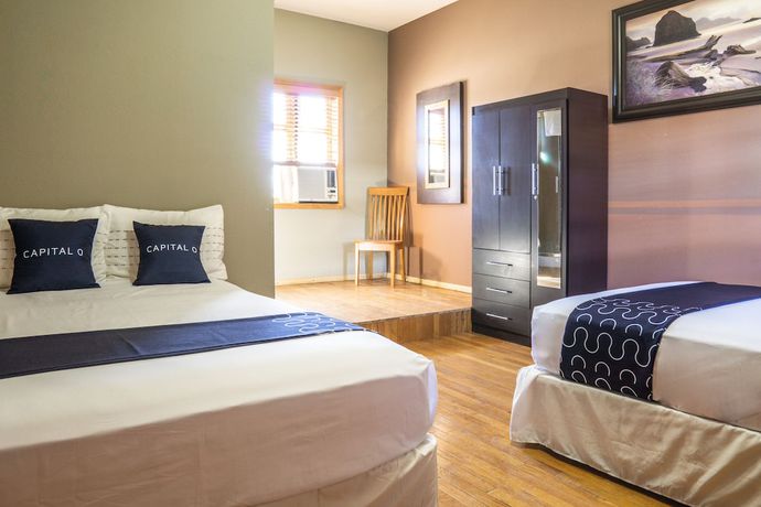 Imagen de la habitación del Hotel Capital O Villa Azura. Foto 10