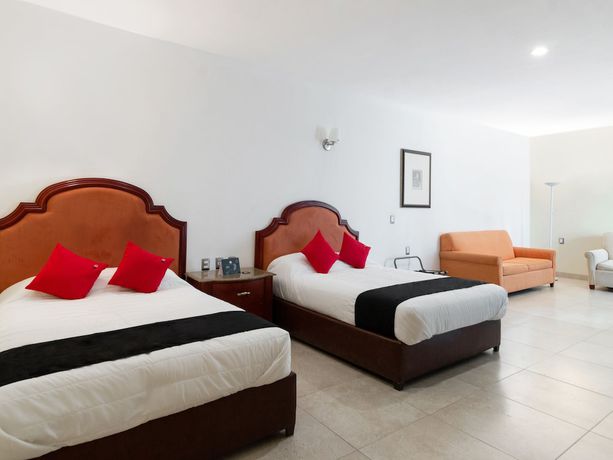 Imagen de la habitación del Hotel Capital O Vital&eacute;. Foto 2