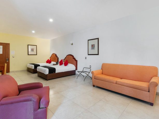 Imagen de la habitación del Hotel Capital O Vital&eacute;. Foto 5