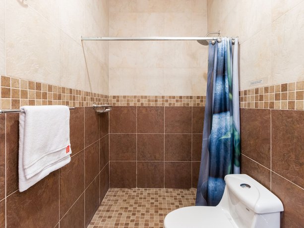 Imagen de la habitación del Hotel Capital O Vital&eacute;. Foto 7