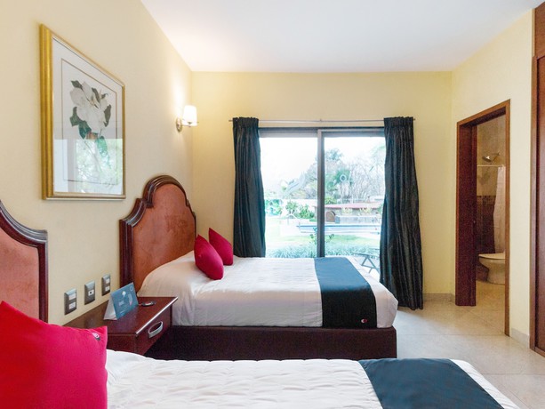 Imagen de la habitación del Hotel Capital O Vital&eacute;. Foto 8