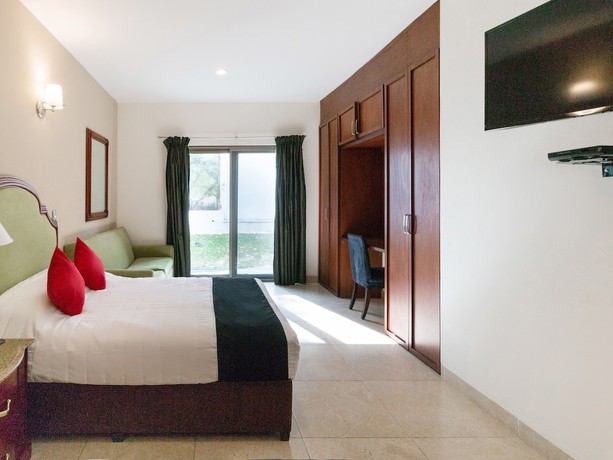Imagen de la habitación del Hotel Capital O Vital&eacute;. Foto 9