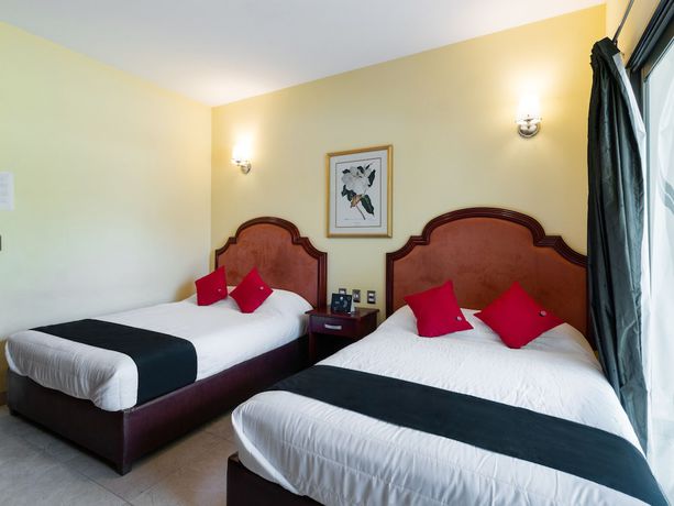 Imagen de la habitación del Hotel Capital O Vital&eacute;. Foto 10