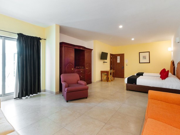 Imagen de la habitación del Hotel Capital O Vital&eacute;. Foto 12