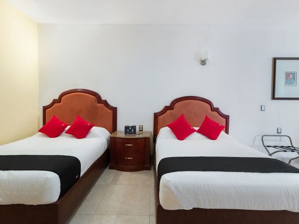 Imagen de la habitación del Hotel Capital O Vital&eacute;. Foto 14