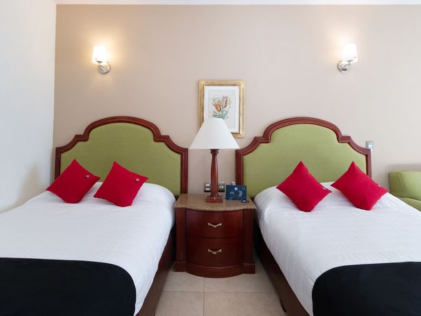 Imagen de la habitación del Hotel Capital O Vital&eacute;. Foto 15