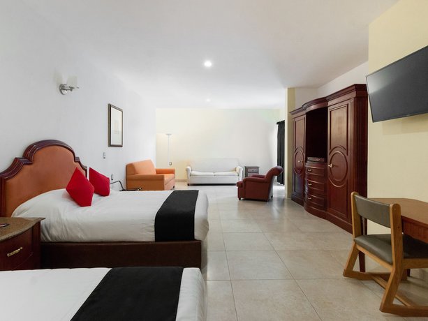 Imagen de la habitación del Hotel Capital O Vital&eacute;. Foto 17