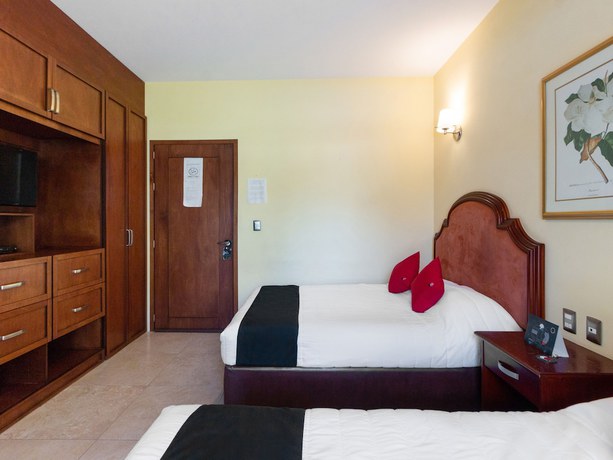 Imagen de la habitación del Hotel Capital O Vital&eacute;. Foto 19