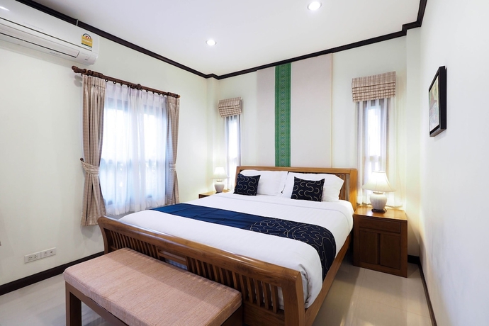 Imagen de la habitación del Hotel Capital O919 Rawisara Villa Resort. Foto 5