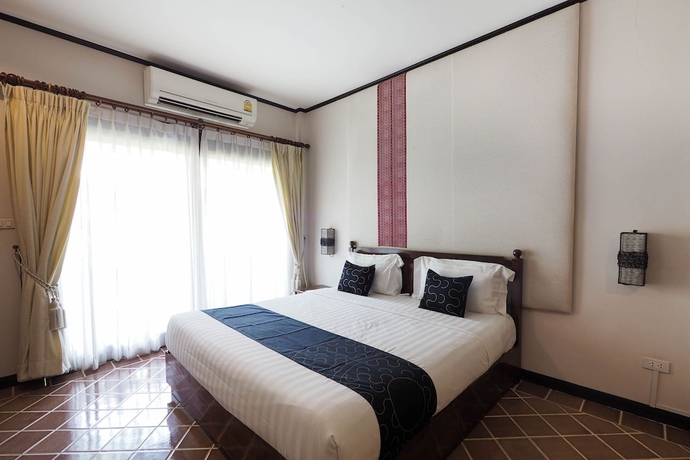 Imagen de la habitación del Hotel Capital O919 Rawisara Villa Resort. Foto 6