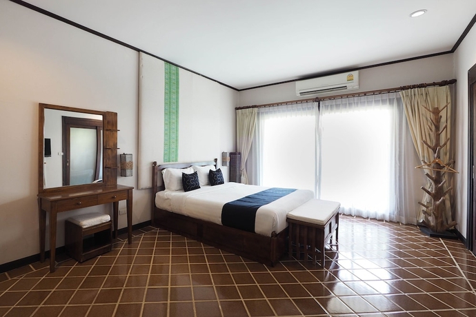 Imagen de la habitación del Hotel Capital O919 Rawisara Villa Resort. Foto 10