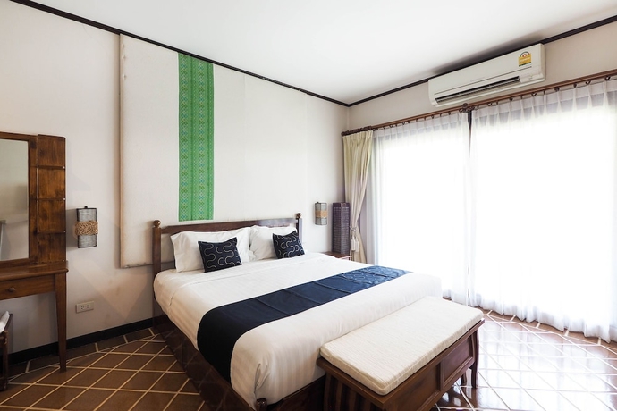 Imagen de la habitación del Hotel Capital O919 Rawisara Villa Resort. Foto 11