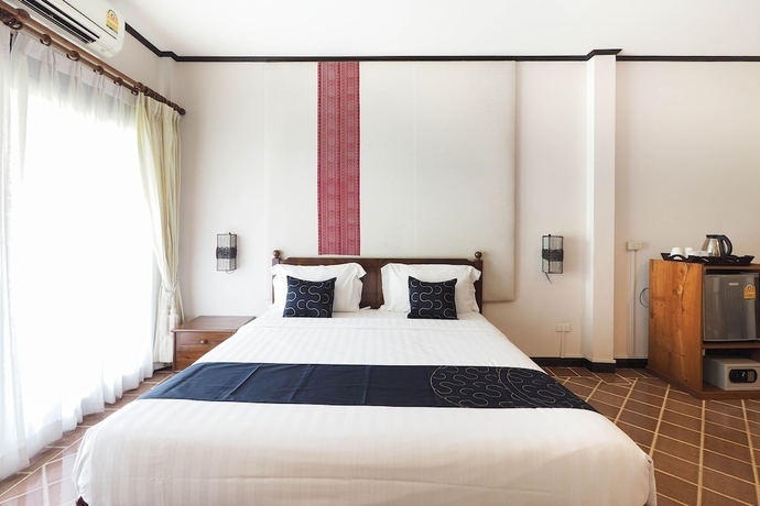 Imagen de la habitación del Hotel Capital O919 Rawisara Villa Resort. Foto 15