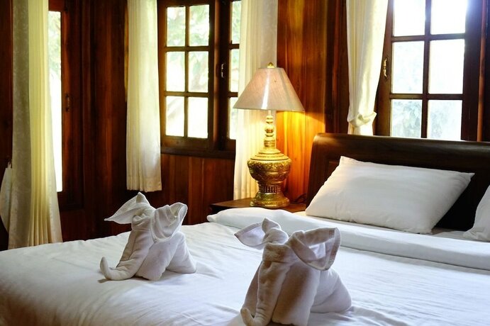 Imagen de la habitación del Hotel Capital O923 Elephant At Baan Tawai. Foto 18