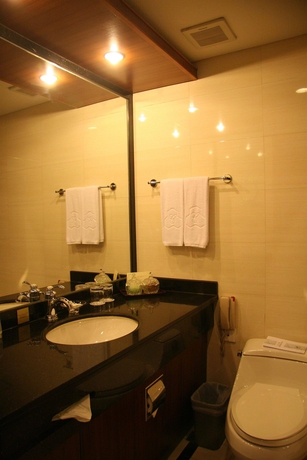 Imagen de la habitación del Hotel Capital, Pekin. Foto 5